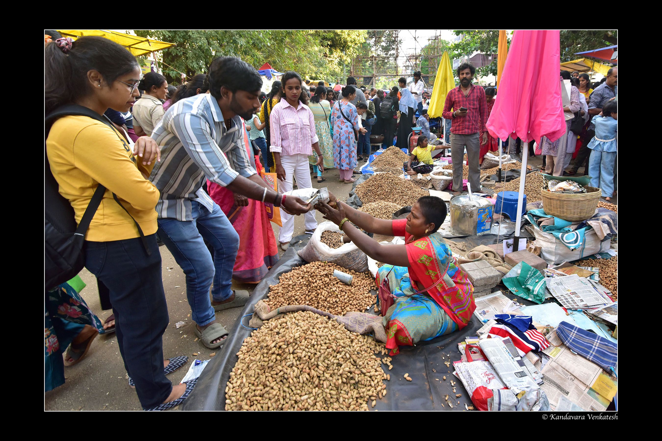 Jute crafts and wooden toys alongside peanut stalls
